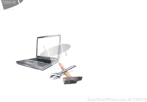 Image of laptop and tools