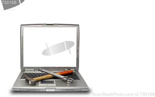 Image of laptop and tools