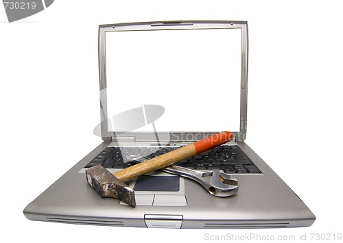 Image of laptop and tools