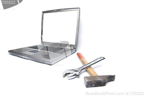 Image of laptop and tools