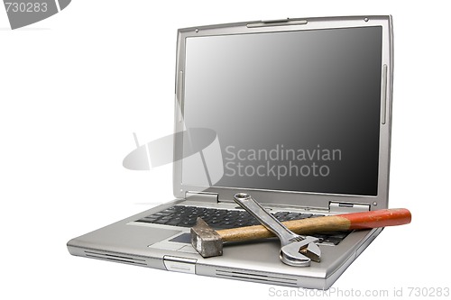 Image of laptop and tools