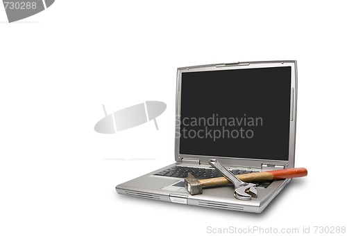 Image of laptop and tools