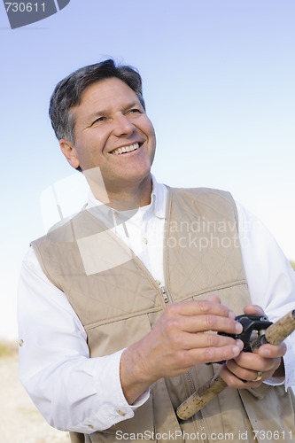 Image of Man Fishing in River