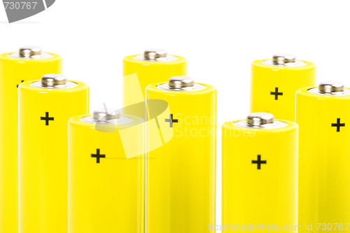 Image of eight yellow alkaline batteries