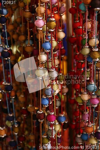 Image of Bundle of colorful beads on a string