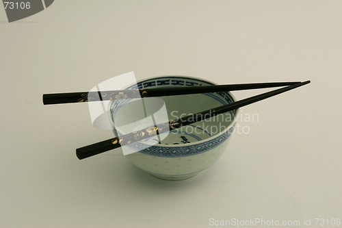 Image of Black chopsticks with chinese bowl