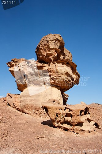 Image of Scenic orange rock in shape of mushroom in the desert