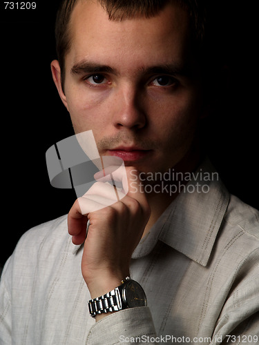 Image of Young man thinking