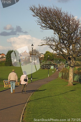 Image of Couple walking on coastal path