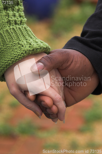 Image of Man & Woman holding hands