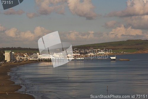 Image of Seaside pier with beach and sea