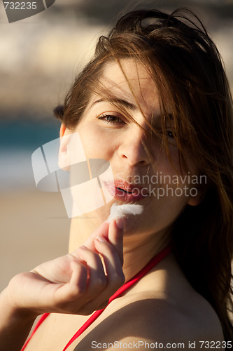 Image of Blowing a feather