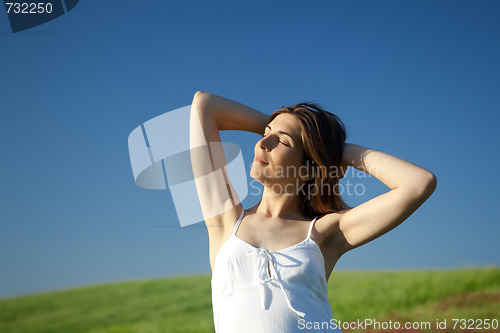 Image of Young woman relaxing