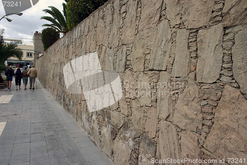 Image of Walking along a stonewall