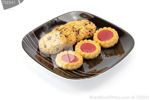 Image of cookies on plate isolated on white backgrounds