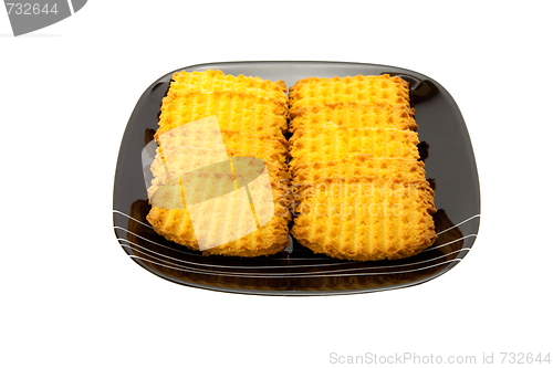 Image of cookies on plate isolated on white backgrounds