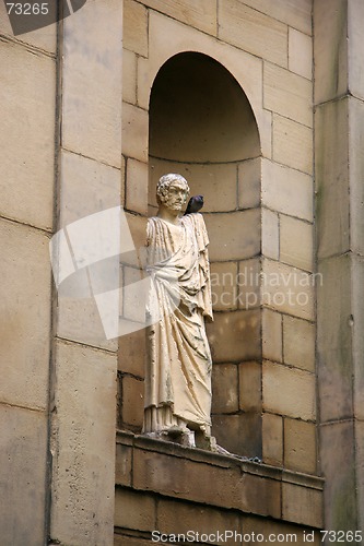 Image of Male Statue in Alcove (with pigeon)