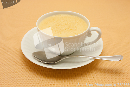 Image of Closeup of coffee with milk in white cup