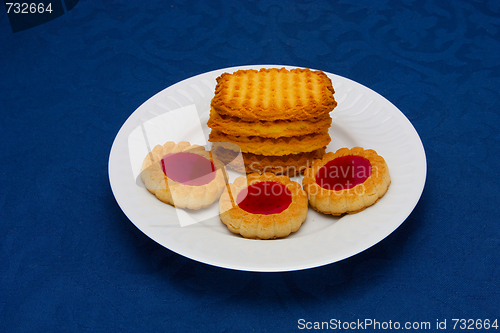 Image of cookies on a Plate on a blue background