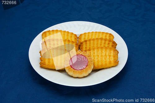 Image of cookies on a Plate on a blue background