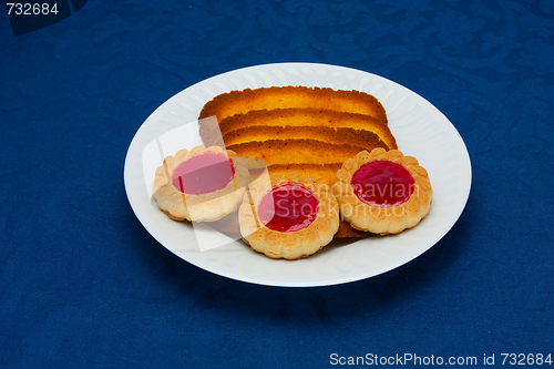 Image of cookies on a Plate on a blue background 