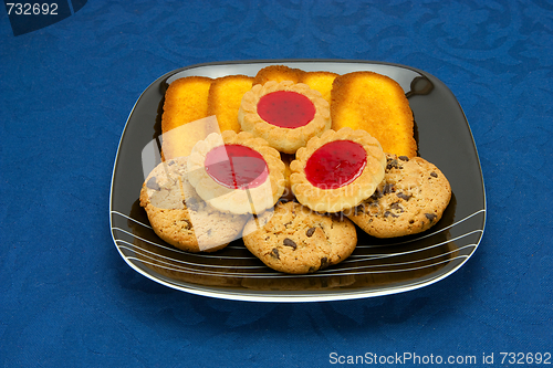 Image of cookies on a Plate on a blue background