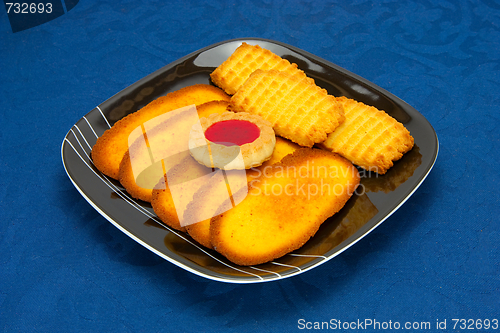 Image of cookies on a Plate on a blue background