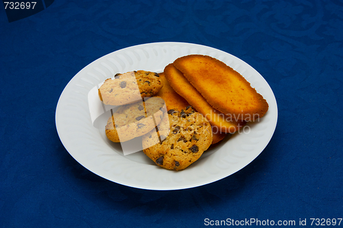 Image of cookies on a Plate on a blue background