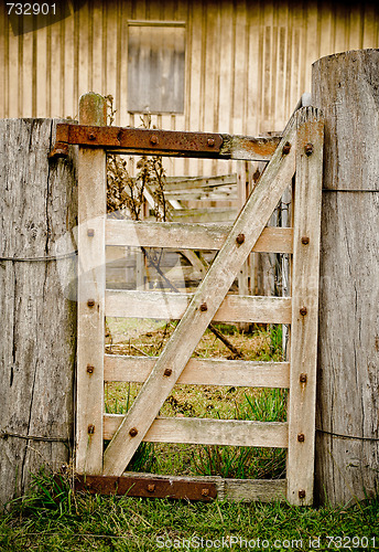 Image of old tired rural farm gate