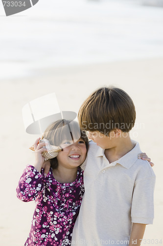 Image of Two Children With Shell