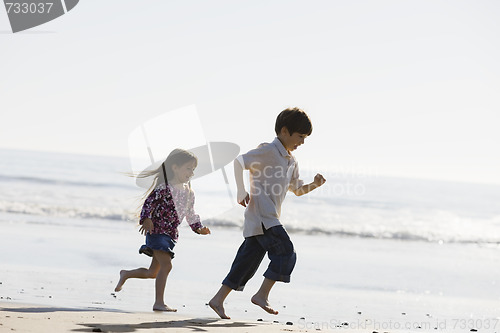 Image of Kids Running on Beach