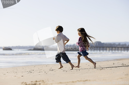 Image of Kids Running on Beach