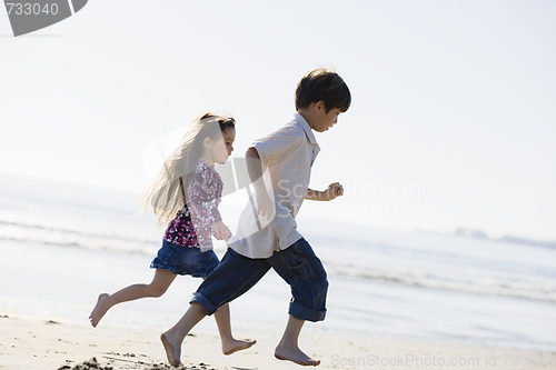 Image of Kids Running on Beach