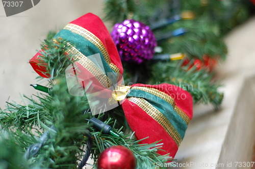 Image of red, gold, and green holiday ribbon
