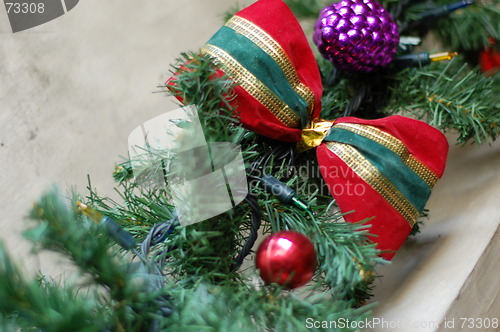 Image of red, gold, and green holiday ribbon