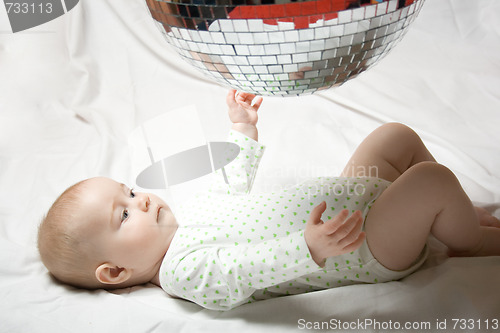 Image of Baby and disco ball