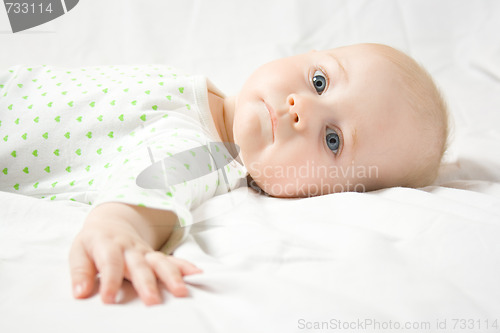 Image of Cute baby looks at you