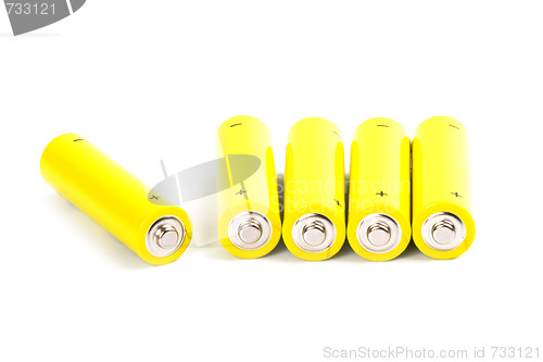 Image of five yellow alkaline batteries