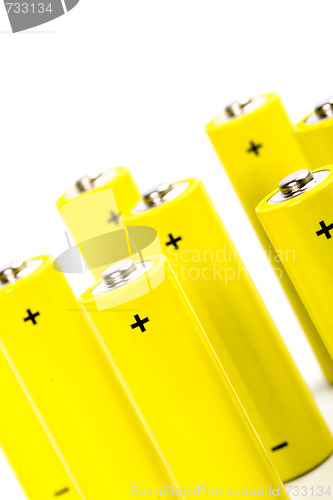 Image of eight yellow alkaline batteries