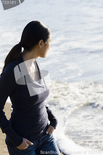 Image of Woman Looking At Ocean