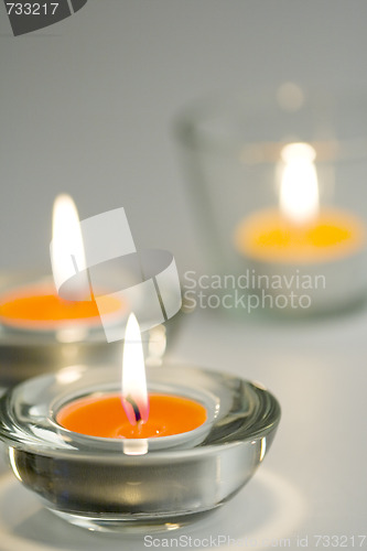 Image of three candles flaming