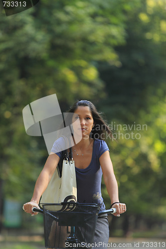 Image of Woman Riding A Bicycle