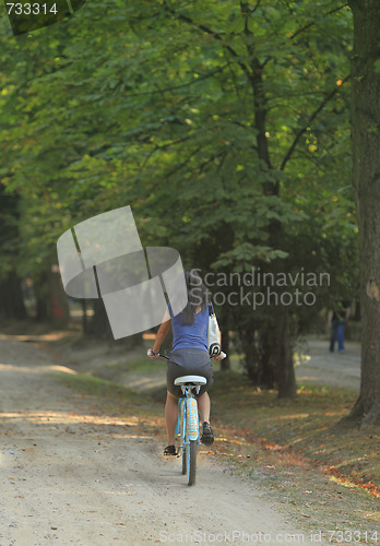 Image of Woman Riding A Bicycle