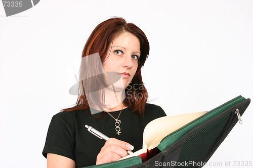 Image of Woman writing