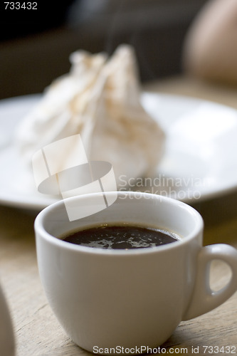 Image of cup of coffee and meringue