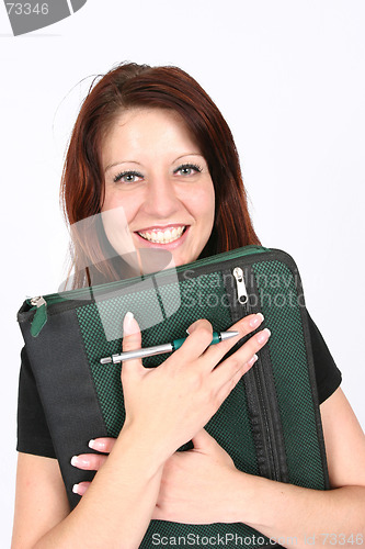 Image of Businesswoman holding file