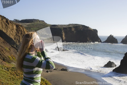 Image of Woman Yelling on Cliff