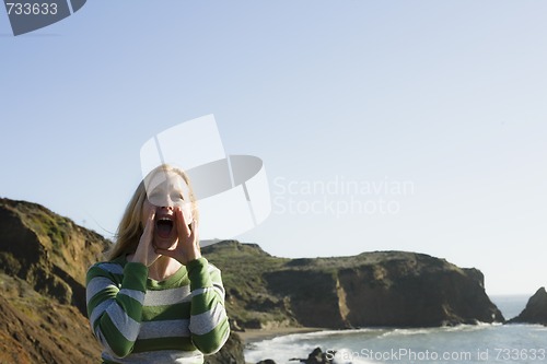 Image of Woman Yelling On Cliff