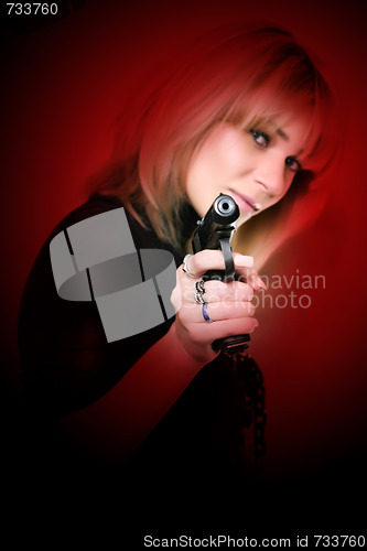 Image of beautiful girl to keep in hand pistol 