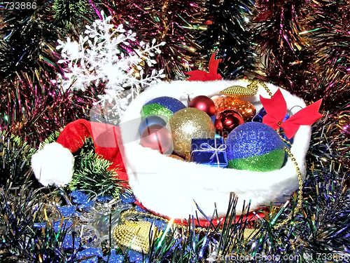 Image of Christmas hat in garlands